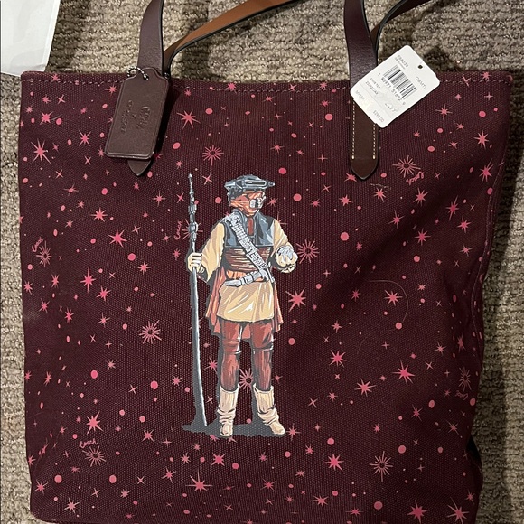Coach Handbags - Coach Star Wars Stylish Burgundy Tote Bag with Warrior Design